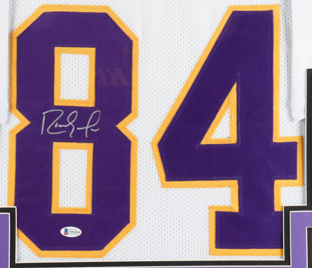 : Randy Moss Autographed Purple Jersey - Beautifully